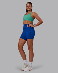 Woman wearing Fusion Ultra High-Rise 6" Short Pockets - Blue Quartz | Model:Phoebe | Size:S | Thumbnail Index: 2