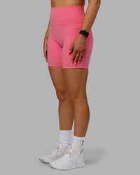 Woman wearing Fusion Ultra High-Rise 6" Short Pockets - Pink Lemonade | Model:Halle | Size:S | Thumbnail Index: 3