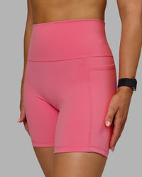 Woman wearing Fusion Ultra High-Rise 6" Short Pockets - Pink Lemonade | Model:Halle | Size:S | Thumbnail Index: 4