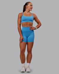 Woman wearing Fusion Ultra High-Rise 6" Short Pockets - Azure Blue | Model:Amber | Size:S | Thumbnail Index: 4
