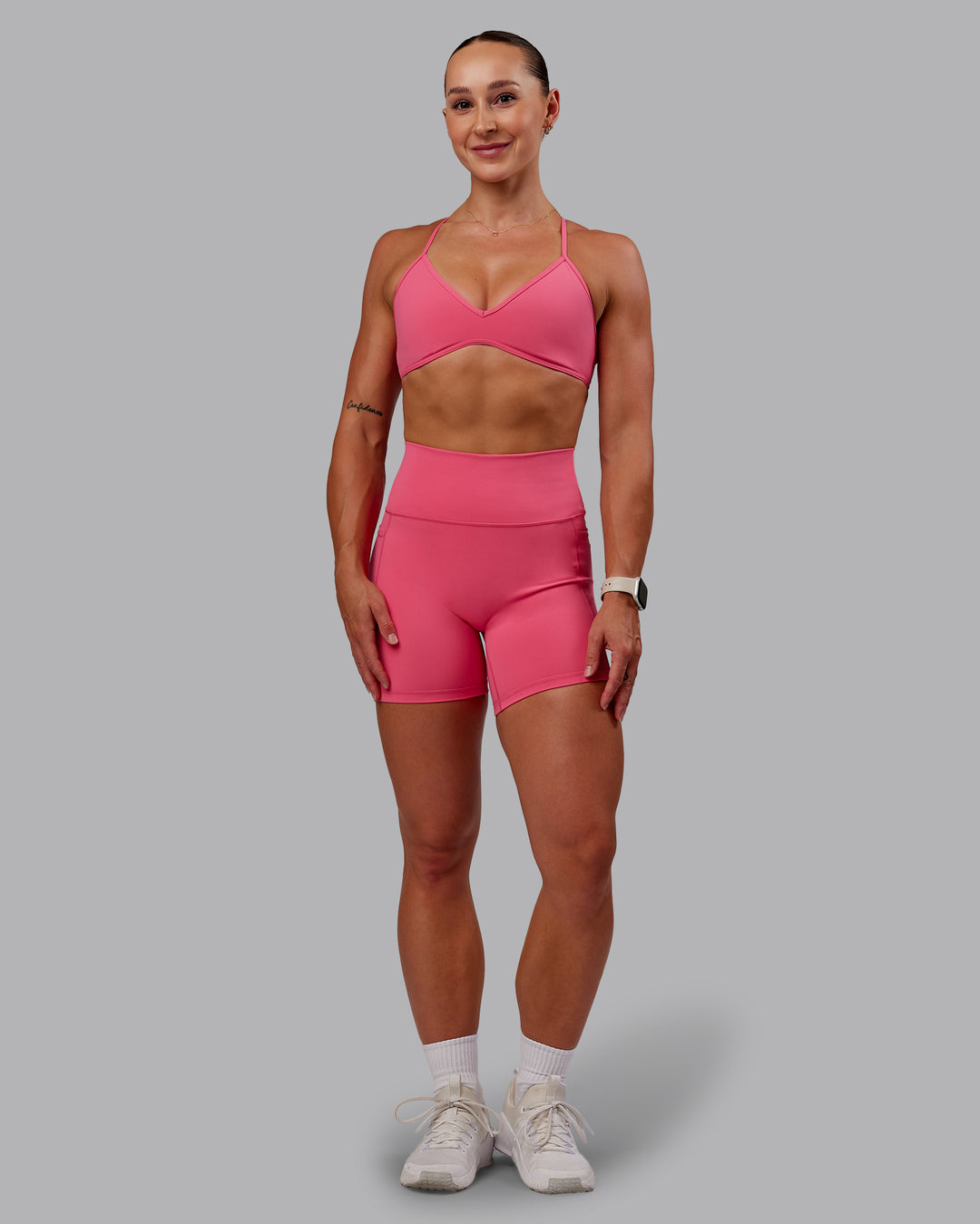 Woman wearing Fusion Ultra High-Rise 6" Short Pockets - Hot Pink | Model:Amber | Size:S - view 2