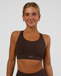 Woman wearing Fusion Sports Bra 2.0 - Hot Chocolate | Model:Amity | Size:S | Thumbnail Index: 0