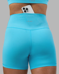 Woman wearing Fusion Ultra High-Rise 4" Short - Blue Atoll | Model:Georgia | Size:S | Thumbnail Index: 2