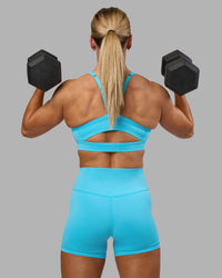 Woman wearing Fusion Ultra High-Rise 4" Short - Blue Atoll | Model:Georgia | Size:S | Thumbnail Index: 5