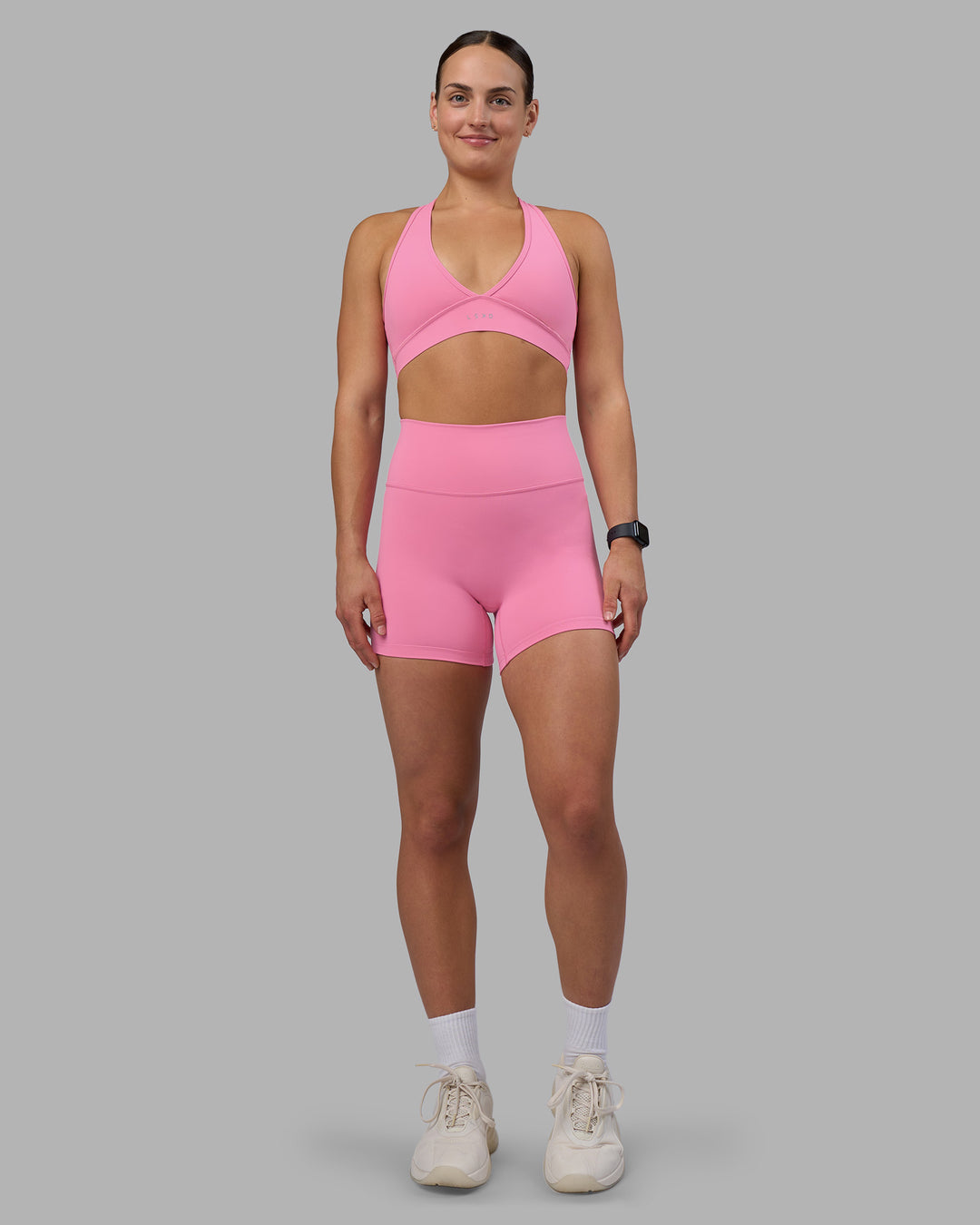 Woman wearing Fusion Ultra High-Rise 4" Short - Candy Pink | Model:Keisha | Size:S - view 1