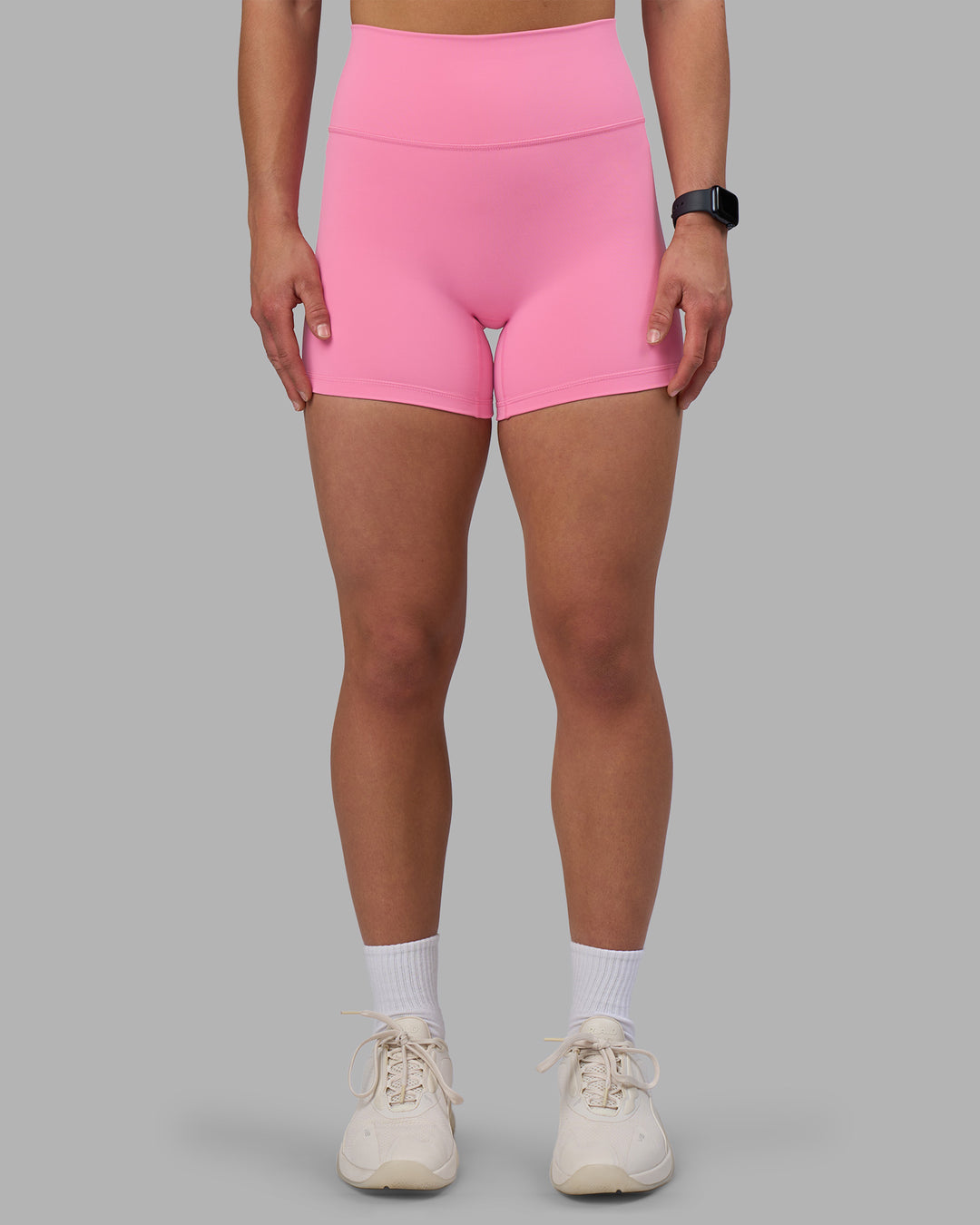 Woman wearing Fusion Ultra High-Rise 4" Short - Candy Pink | Set:true | Angle:front | Model:Keisha | Size:S - view 6