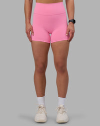 Woman wearing Fusion Ultra High-Rise 4" Short - Candy Pink | Set:true | Angle:front | Model:Keisha | Size:S | Thumbnail Index: 5