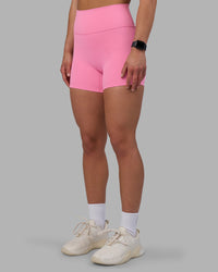 Woman wearing Fusion Ultra High-Rise 4" Short - Candy Pink | Set:true | Angle:side | Model:Keisha | Size:S | Thumbnail Index: 2