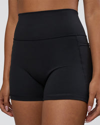 Woman wearing Fusion Ultra High-Rise 4" Short Pockets - Black | Model:Ruby | Size:S | Thumbnail Index: 5