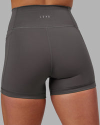 Woman wearing Fusion Ultra High-Rise 4" Short Pockets - Dark Storm | Model:Keisha | Size:S | Thumbnail Index: 8
