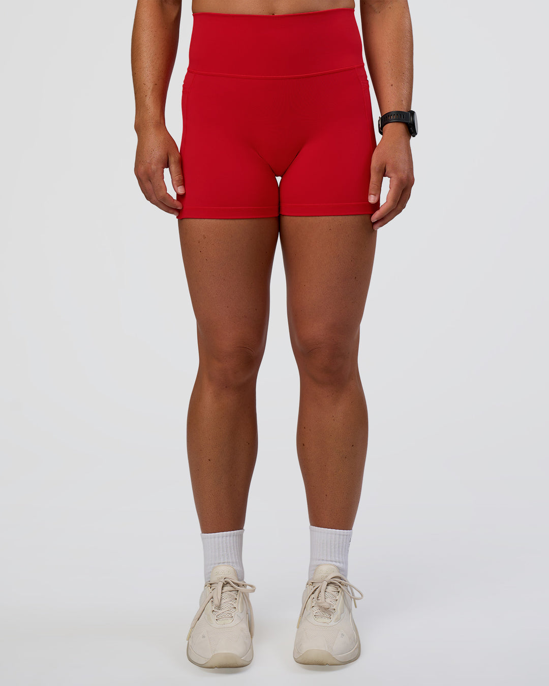 Woman wearing Fusion Ultra High-Rise 4" Short Pockets - Flame | Set:true | Angle:front | Model:Sav | Size:S - view 7
