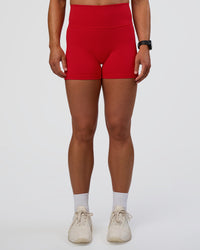 Woman wearing Fusion Ultra High-Rise 4" Short Pockets - Flame | Set:true | Angle:front | Model:Sav | Size:S | Thumbnail Index: 6
