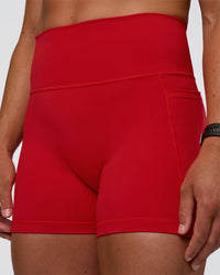 Woman wearing Fusion Ultra High-Rise 4" Short Pockets - Flame | Model:Sav | Size:S | Thumbnail Index: 0