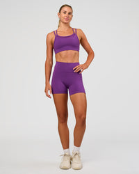 Woman wearing Fusion Ultra High-Rise 4" Short Pockets - Fresh Purple | Model:Emelia | Size:S | Thumbnail Index: 2