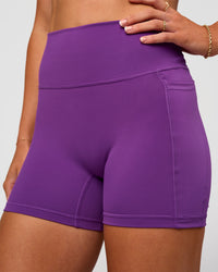 Woman wearing Fusion Ultra High-Rise 4" Short Pockets - Fresh Purple | Model:Emelia | Size:S | Thumbnail Index: 4