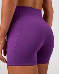 Woman wearing Fusion Ultra High-Rise 4" Short Pockets - Fresh Purple | Model:Emelia | Size:S | Thumbnail Index: 6