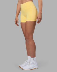 Woman wearing Fusion Ultra High-Rise 4" Short Pockets - Lemon | Model:Sophie | Size:S | Thumbnail Index: 6