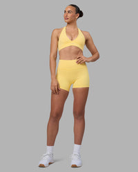 Woman wearing Fusion Ultra High-Rise 4" Short Pockets - Lemon | Model:Sophie | Size:S | Thumbnail Index: 4