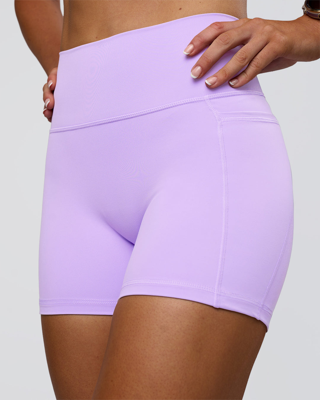 Woman wearing Fusion Ultra High-Rise 4" Short Pockets - Pale Lilac | Model:Emelia | Size:S - view 5