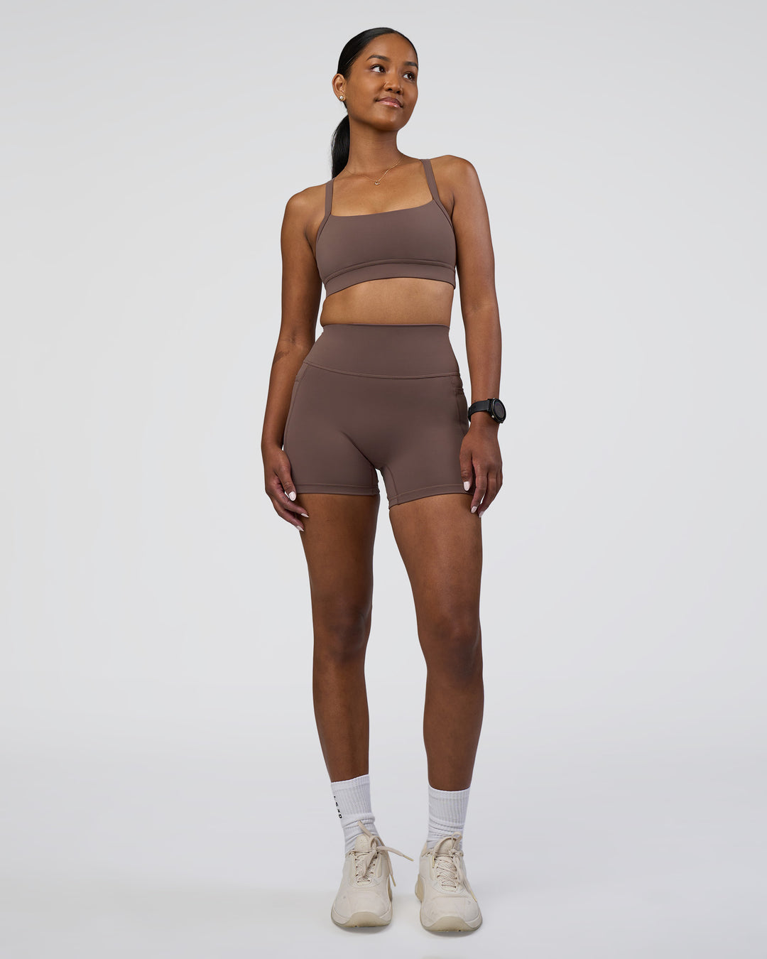 Woman wearing Fusion Ultra High-Rise 4" Short Pockets - Peppercorn | Model:Rica | Size:S - view 5