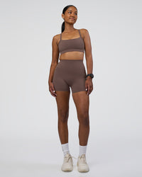 Woman wearing Fusion Ultra High-Rise 4" Short Pockets - Peppercorn | Model:Rica | Size:S | Thumbnail Index: 4