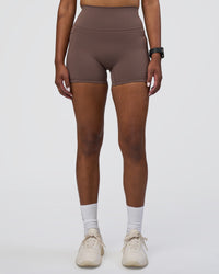Woman wearing Fusion Ultra High-Rise 4" Short Pockets - Peppercorn | Set:true | Angle:front | Model:Rica | Size:S | Thumbnail Index: 6