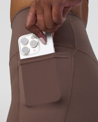 Woman wearing Fusion Ultra High-Rise 4" Short Pockets - Peppercorn | Model:Rica | Size:S | Thumbnail Index: 5