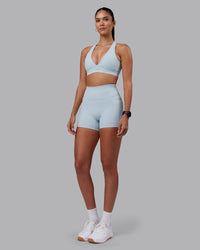 Woman wearing Fusion Ultra High-Rise 4" Short Pockets - Skyride | Model:Rhiley | Size:S | Thumbnail Index: 2
