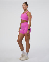 Woman wearing Fusion Ultra High-Rise 4" Short Pockets - Ultra Fuchsia | Model:Abbey | Size:S | Thumbnail Index: 4