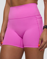 Woman wearing Fusion Ultra High-Rise 4" Short Pockets - Ultra Fuchsia | Model:Abbey | Size:S | Thumbnail Index: 5