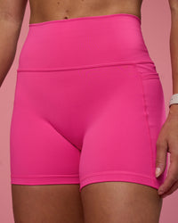 Woman wearing Fusion Ultra High-Rise 4" Short Pockets - Ultra Pink | Model:Hannah | Size:S | Thumbnail Index: 7