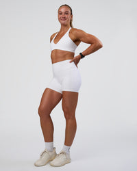 Woman wearing Fusion Ultra High-Rise 4" Short Pockets - White | Model:Sav | Size:S | Thumbnail Index: 4