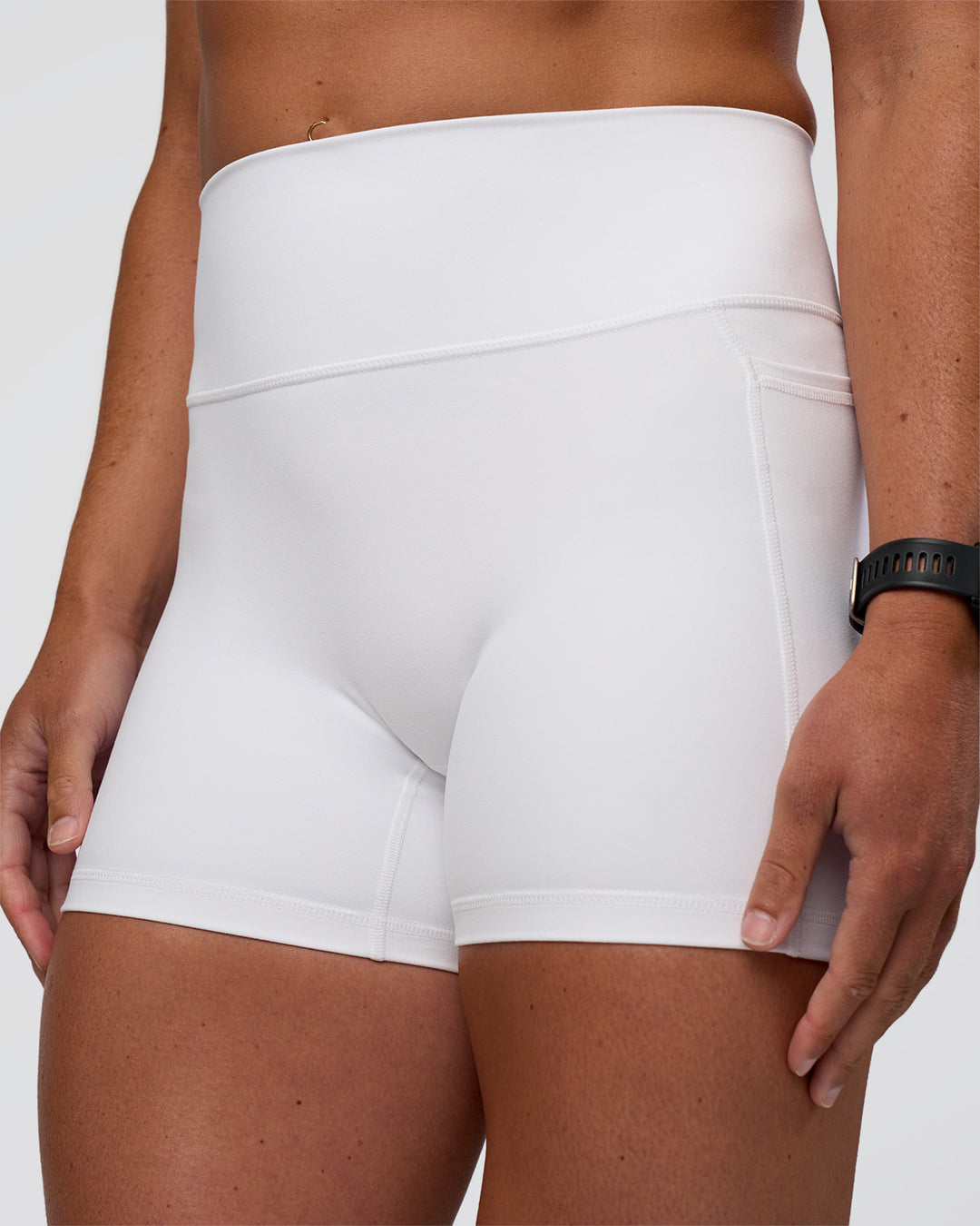 Woman wearing Fusion Ultra High-Rise 4" Short Pockets - White | Model:Sav | Size:S - view 6
