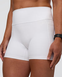 Woman wearing Fusion Ultra High-Rise 4" Short Pockets - White | Model:Sav | Size:S | Thumbnail Index: 5