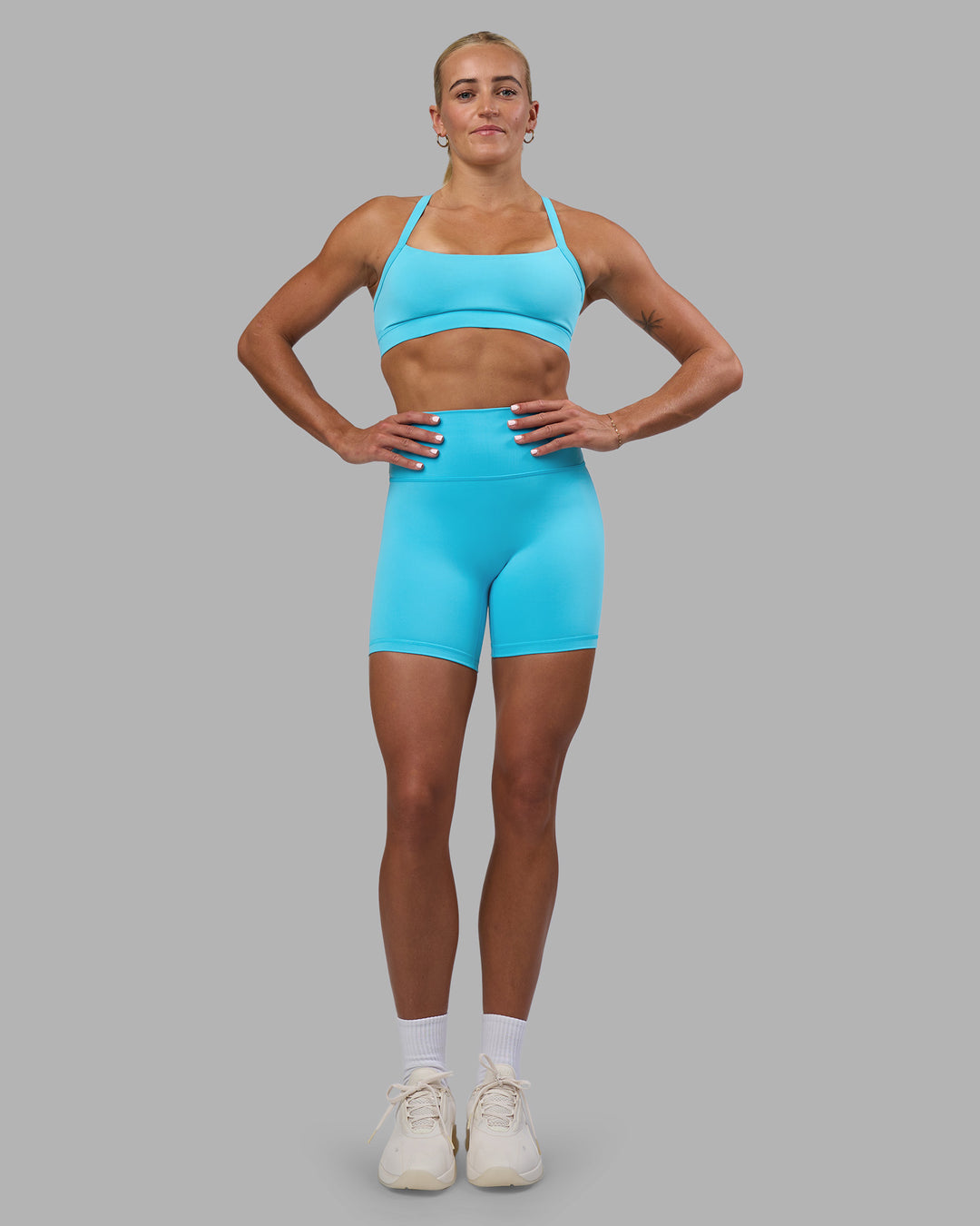 Woman wearing Fusion Ultra High-Rise 6" Short - Blue Atoll | Model:Katie | Size:S - view 3