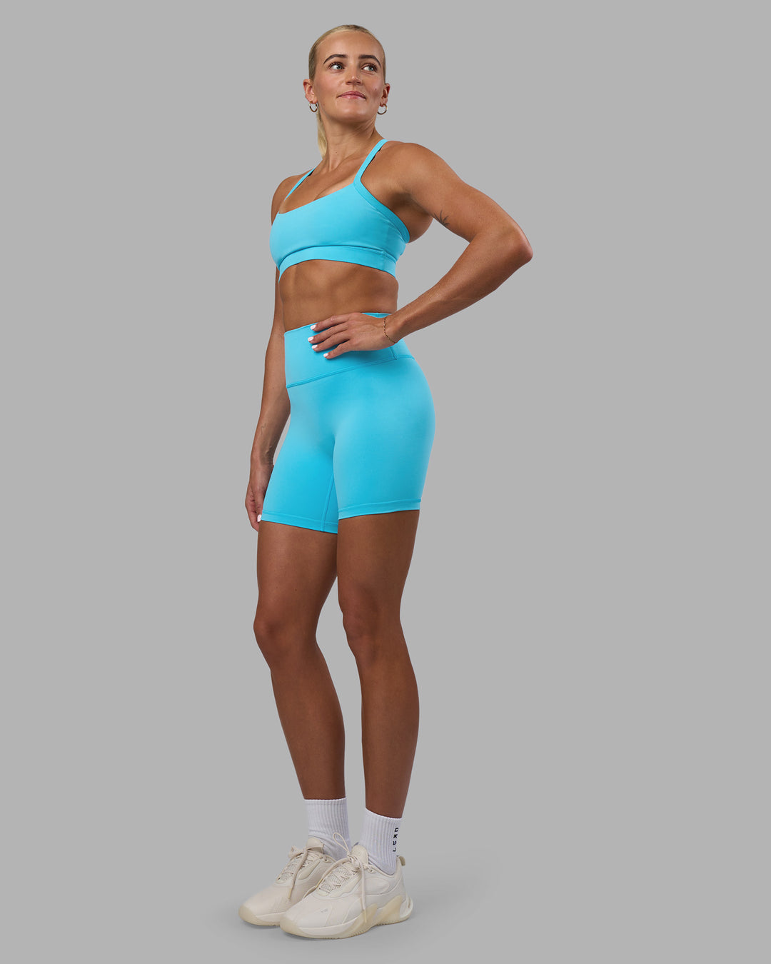 Woman wearing Fusion Ultra High-Rise 6" Short - Blue Atoll | Model:Katie | Size:S - view 5