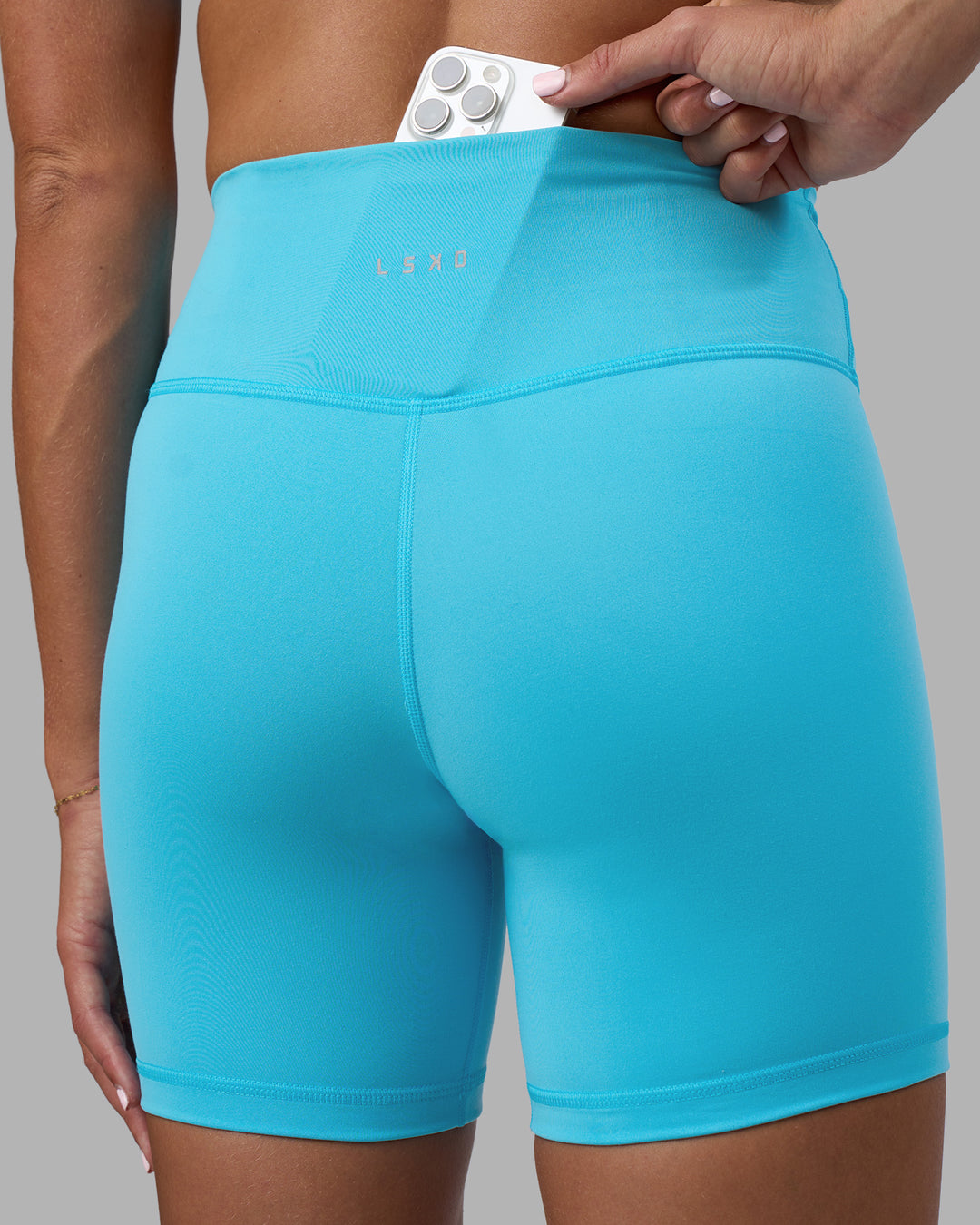 Woman wearing Fusion Ultra High-Rise 6" Short - Blue Atoll | Model:Katie | Size:S - view 7
