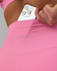 Woman wearing Fusion Ultra High-Rise 6" Short - Candy Pink | Set:true | Angle:closeup | Model:Keisha | Size:S | Thumbnail Index: 3