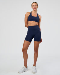 Woman wearing Fusion Ultra High-Rise 6" Short - Future Navy | Model:Evie | Size:S | Thumbnail Index: 4