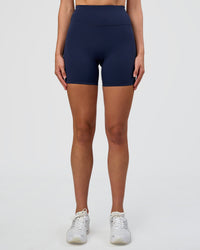 Woman wearing Fusion Ultra High-Rise 6" Short - Future Navy | Set:true | Angle:front | Model:Evie | Size:S | Thumbnail Index: 6