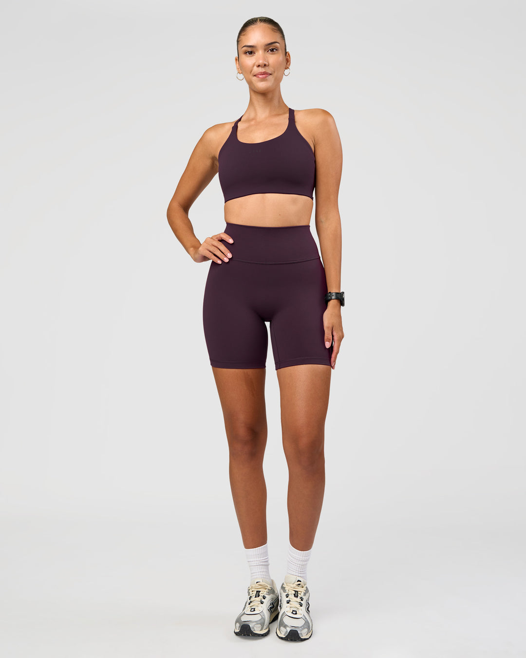 Woman wearing Fusion Ultra High-Rise 6" Short - Midnight Plum | Model:Rhiley | Size:S - view 7