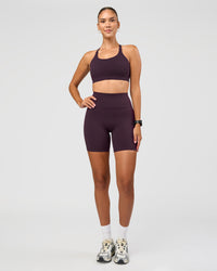 Woman wearing Fusion Ultra High-Rise 6" Short - Midnight Plum | Model:Rhiley | Size:S | Thumbnail Index: 6