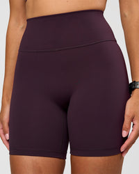 Woman wearing Fusion Ultra High-Rise 6" Short - Midnight Plum | Set:true | Angle:closeup | Model:Rhiley | Size:S | Thumbnail Index: 2