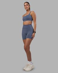 Woman wearing Fusion Ultra High-Rise 6" Short - Night Shadow | Model:Rhiley | Size:S | Thumbnail Index: 1