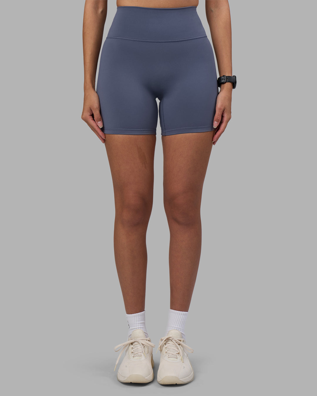 Woman wearing Fusion Ultra High-Rise 6" Short - Night Shadow | Set:true | Angle:front | Model:Rhiley | Size:S - view 4
