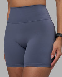 Woman wearing Fusion Ultra High-Rise 6" Short - Night Shadow | Model:Rhiley | Size:S | Thumbnail Index: 0