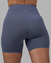 Woman wearing Fusion Ultra High-Rise 6" Short - Night Shadow | Model:Rhiley | Size:S | Thumbnail Index: 5