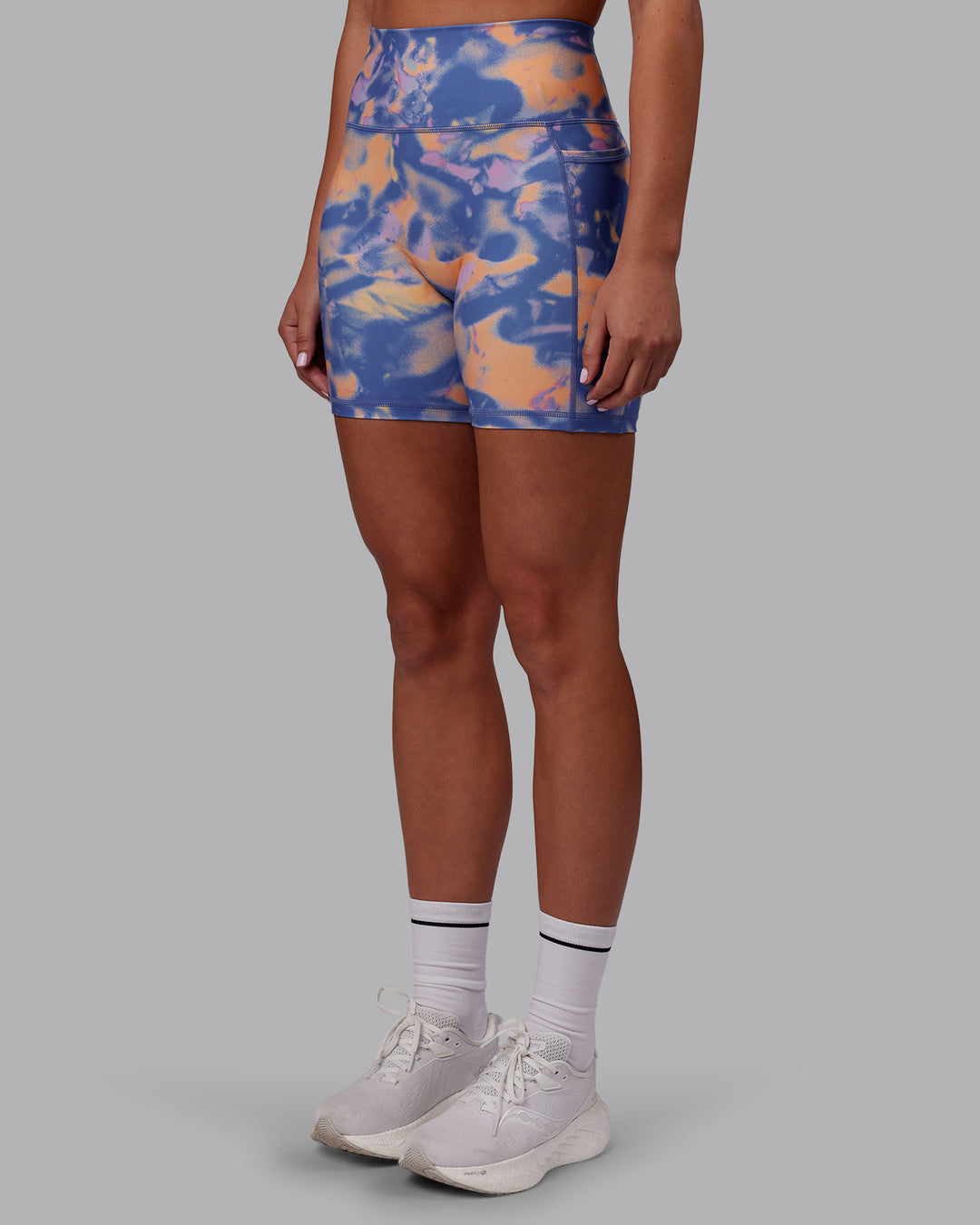 Woman wearing Fusion Ultra High-Rise 6" Short Pockets - Apricot Mist | Set:true | Angle:side | Model:Charlize | Size:S - view 8