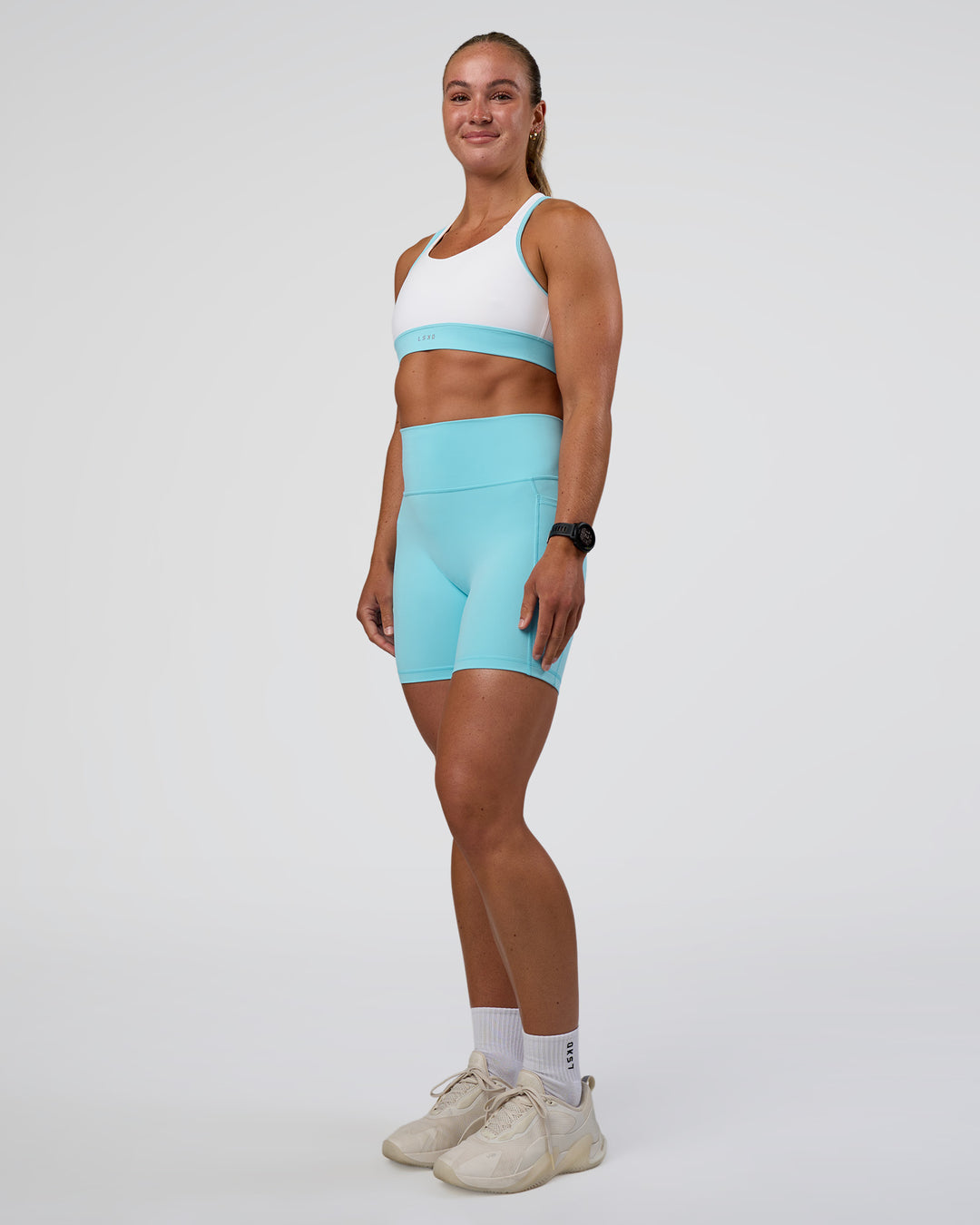 Woman wearing Fusion Ultra High-Rise 6" Short Pockets - Baltic Sea | Model:Sav | Size:S - view 5