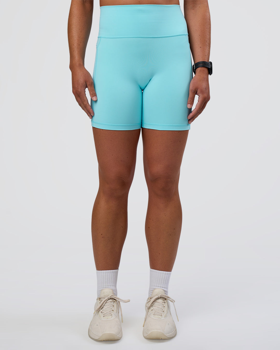 Woman wearing Fusion Ultra High-Rise 6" Short Pockets - Baltic Sea | Set:true | Angle:front | Model:Sav | Size:S - view 6